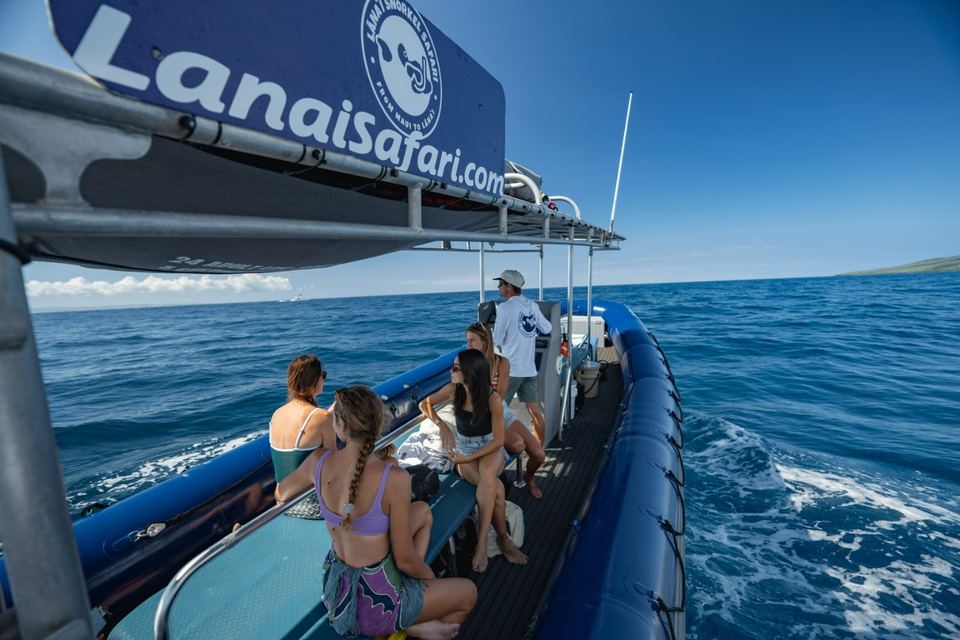 The Lānaʻi Snorkel Safari raft under way across open water with guests aboard